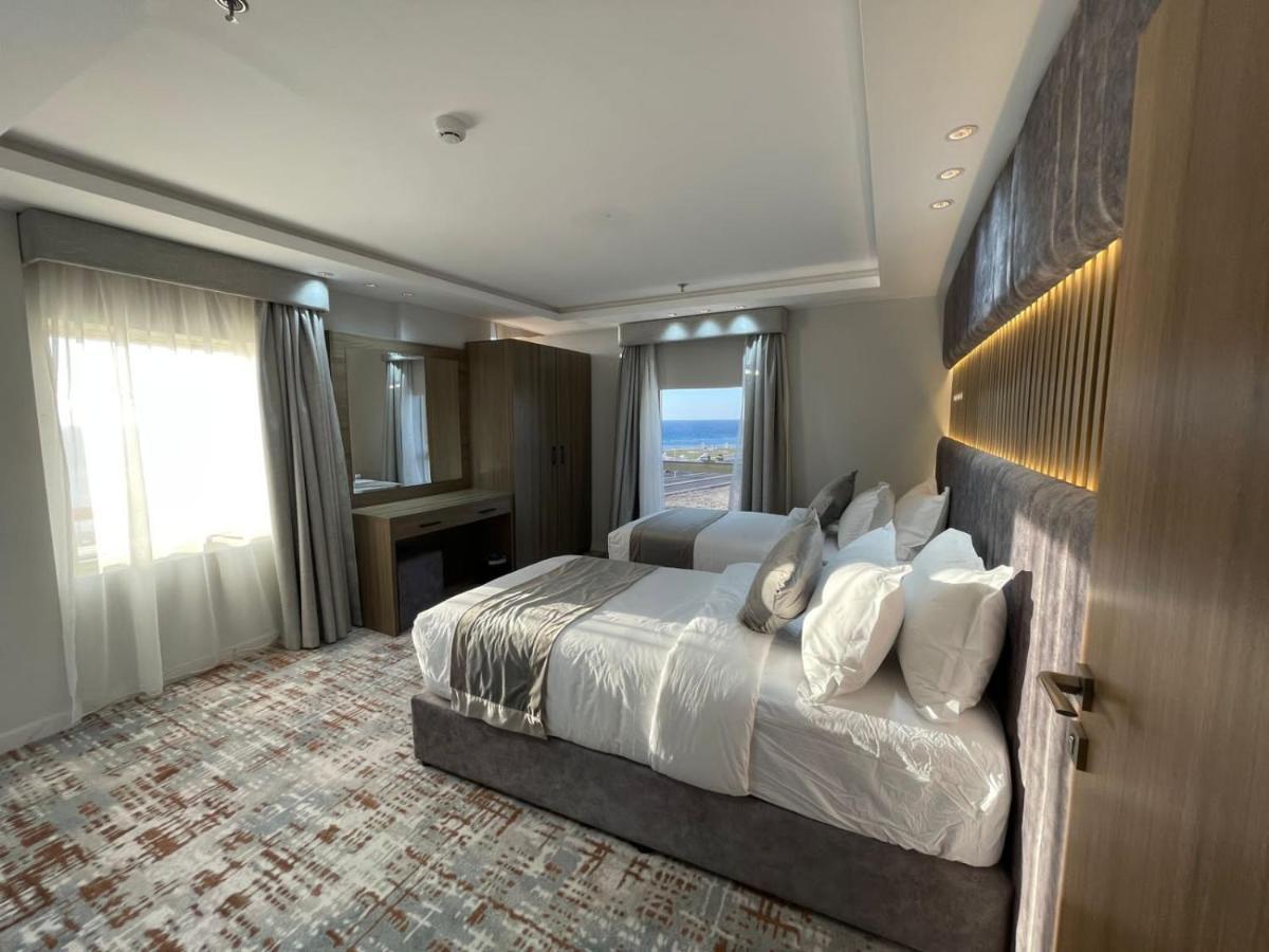 Sweet Land Hotel Umm Lajj Bagian luar foto
