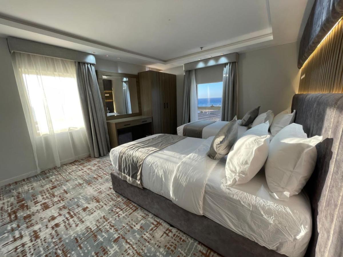 Sweet Land Hotel Umm Lajj Bagian luar foto